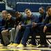 Part of the Michigan basketball team listens to coaches talk to a crowd at a welcome home party on Tuesday, April 9. AnnArbor.com I Daniel Brenner